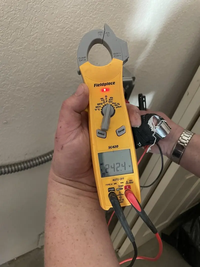 Voltage testing with clamp meter during Circuit Breaker Repair in Wawarsing